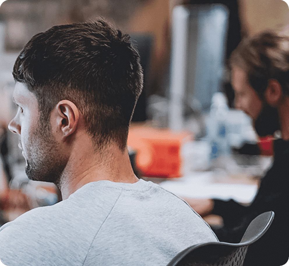 Man in the office seen from behind