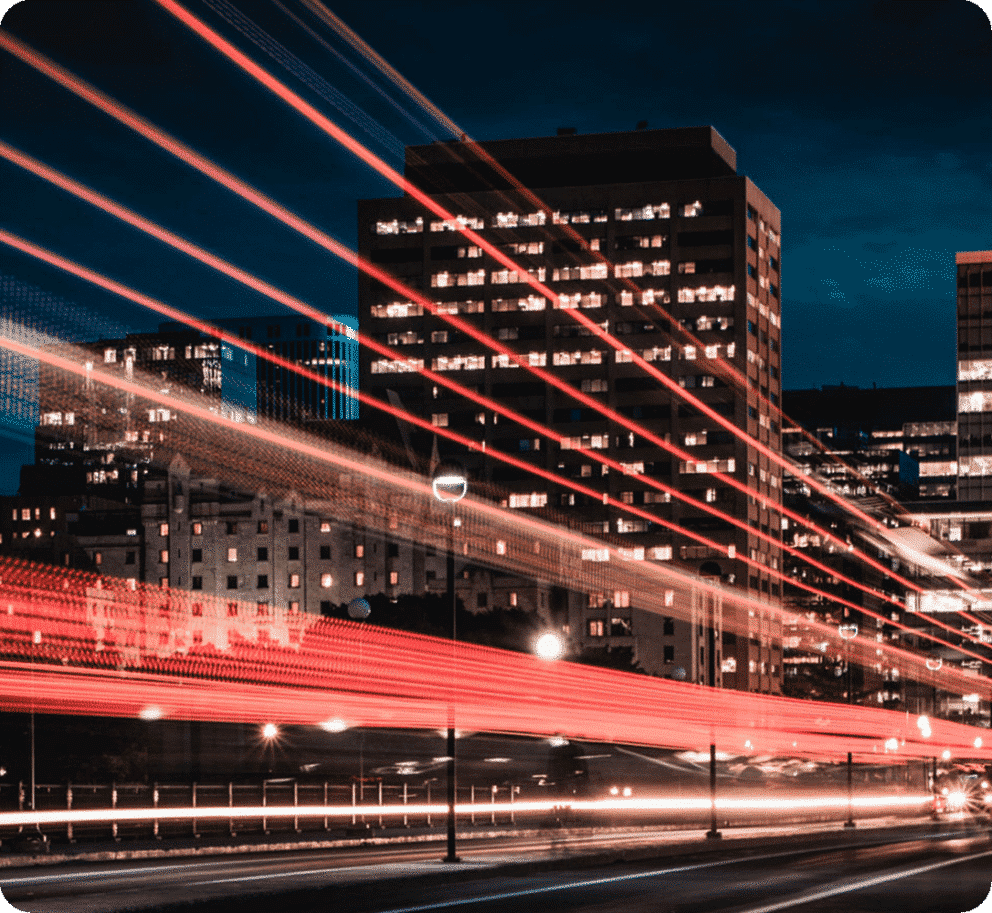 Long exposure at night of city traffic and street lighting.